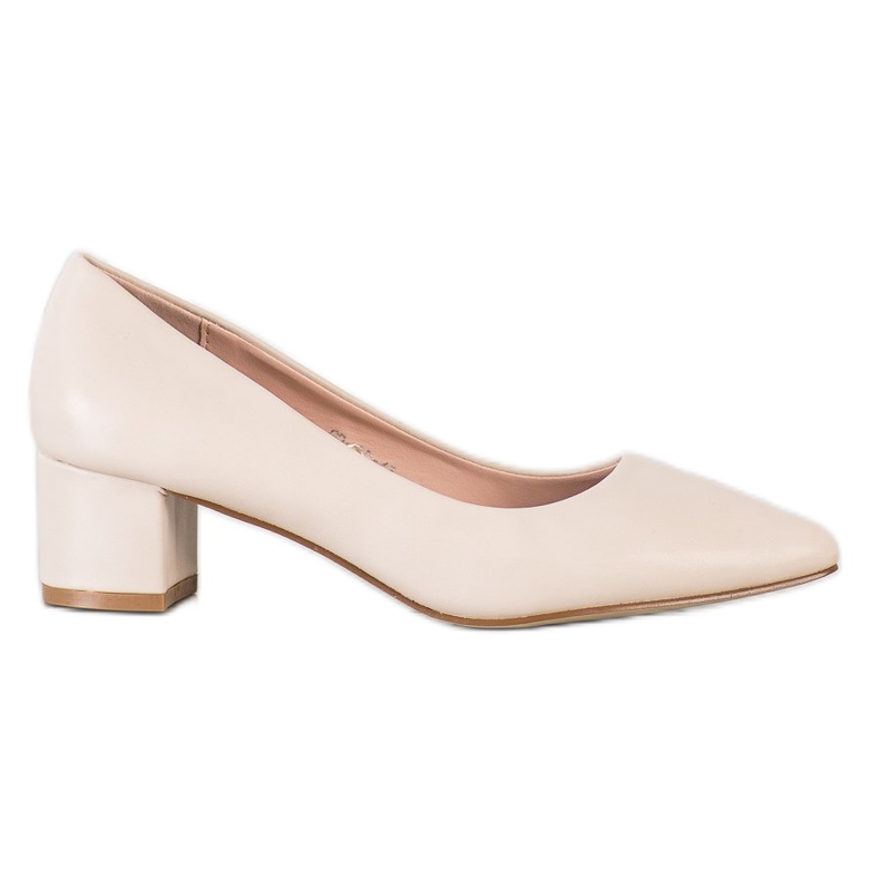 Goodin Pompe su un pilastro basso beige