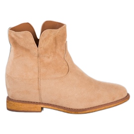 Sergio Todzi Stivali da cowboy su una zeppa beige