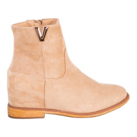 Sergio Todzi Eleganti stivali con zeppa beige