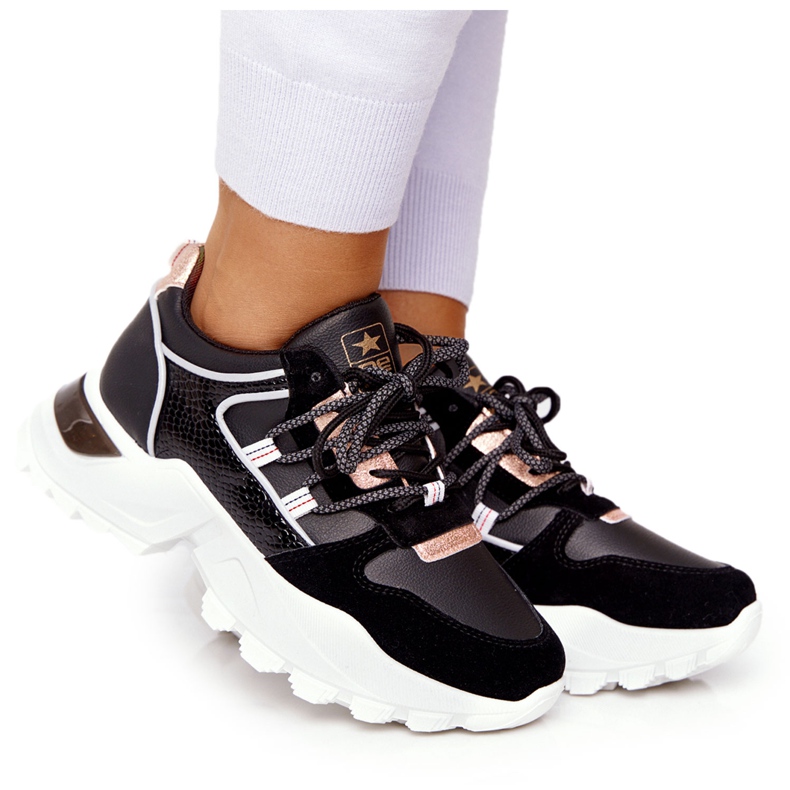 EVE Sneakers da donna su una massiccia suola nera Power nero d'oro