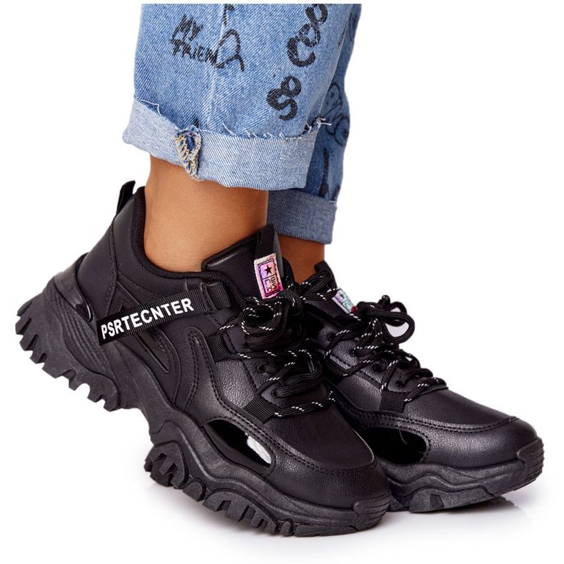 EVE Sneakers da donna su una massiccia suola nera Laugh nero