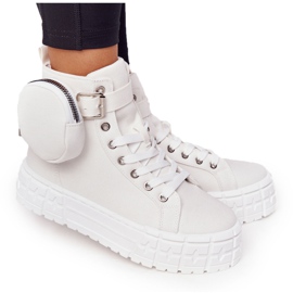 Sneakers da donna su una piattaforma con un popcorn bianco rene