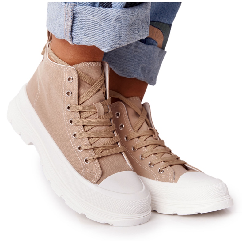 Sneakers Alte Da Donna Su Una Grande Suola Marrone Chiaro Trissy