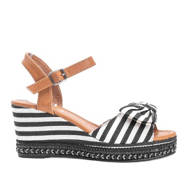 Sandali con zeppa in bianco e nero di Dulce bianca