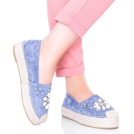 Espadrillas blu sulla suola grossa della signora Nicki