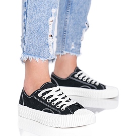 Sneakers nere da donna su una spessa suola Nolita nero