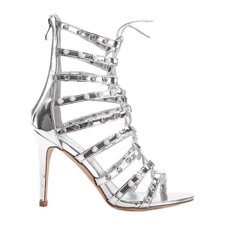 Sandali argento su uno stiletto The Twist d'argento