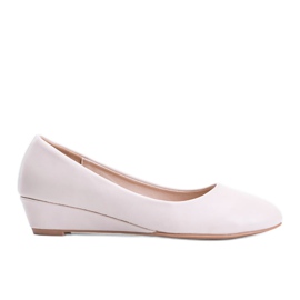 Décolleté beige sulla zeppa bassa Adiess
