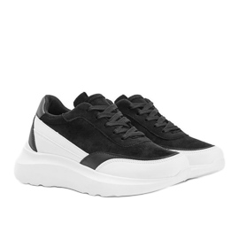 Sneakers nere con dettagli bianchi su suola alta Barteks bianca nero