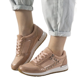 Sneakers sportive rosa decorate con borchie Daphne