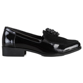 Filippo Scarpe in pelle con un ornamento nero