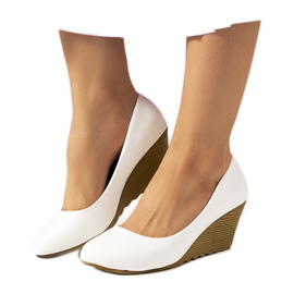 Décolleté bianche sulla zeppa Unies bianco ecru