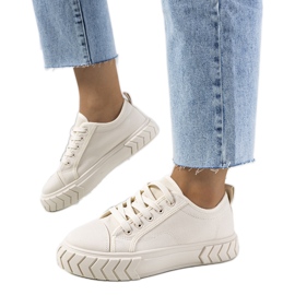 Sneakers beige sulla piattaforma Clarence