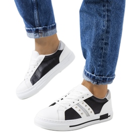 Sneakers nere con borchie Luus bianca nero d'argento
