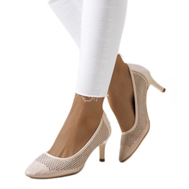 Spille traforate beige e oro d'oro
