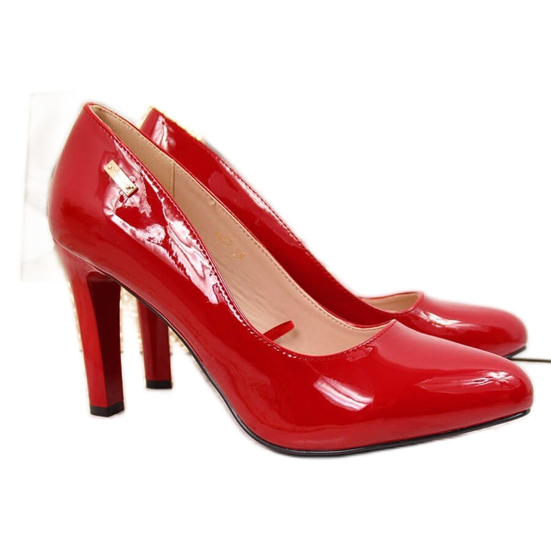 Décolleté rosse laccate sul palo Sergio Leone rosso