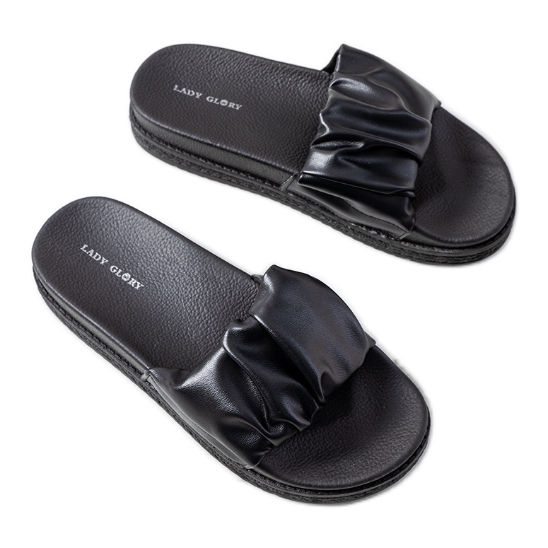 Ciabatte nere sulla piattaforma Baldwin nero