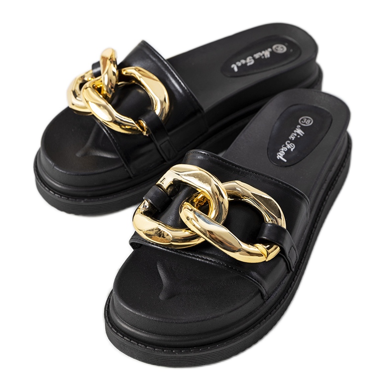 Ciabatte nere sulla piattaforma Berloz nero