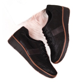 Scarpa da donna in pelle su zeppa nera e marrone Filippo nero
