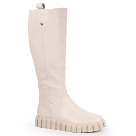 Stivali beige piatti isolati da donna Potocki