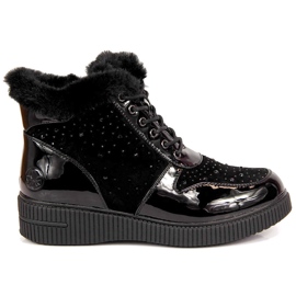 Stivali in pelle isolanti in pelle nera Rieker 93312-00 sulla piattaforma nero