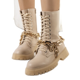 Stivali beige con catena Curiti