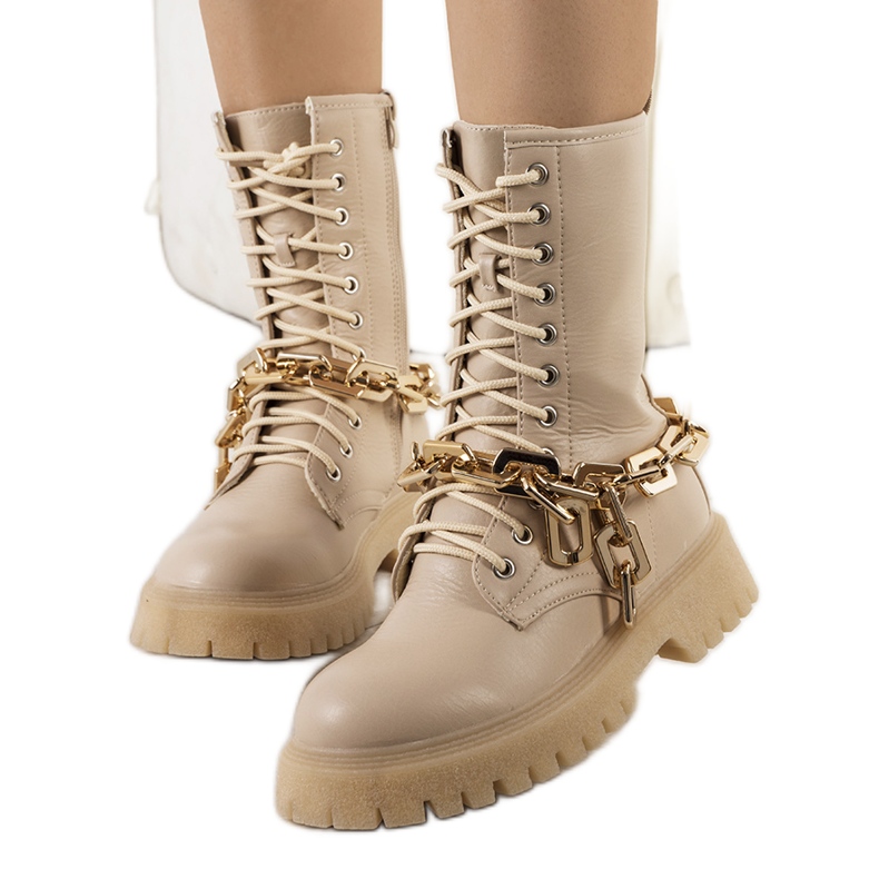 Stivali beige con catena Curiti