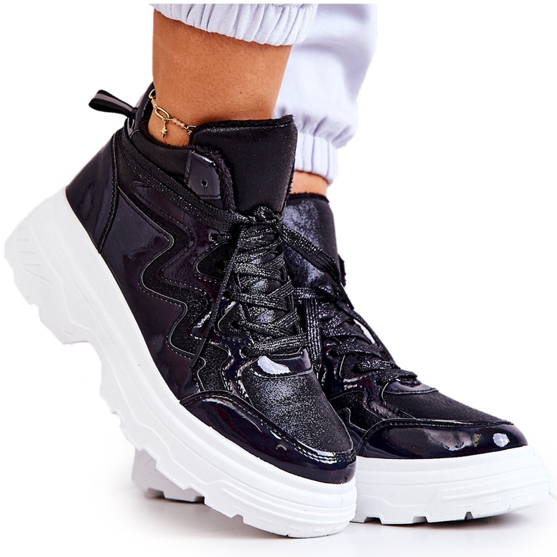 Scarpe sportive isolate da donna nero