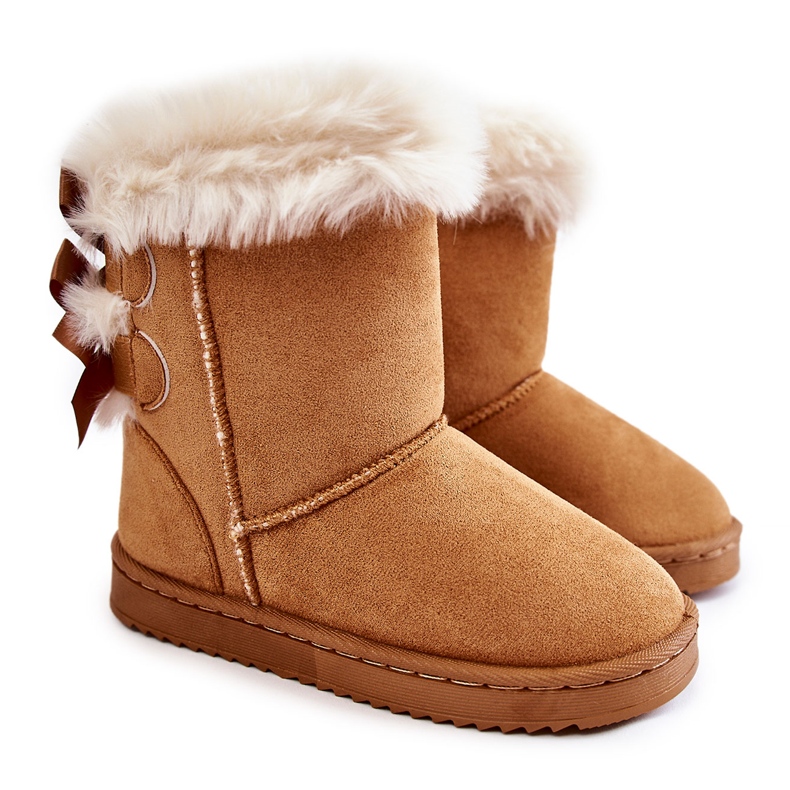 Stivali isolati per bambini con fiocchi, stivali da neve beige