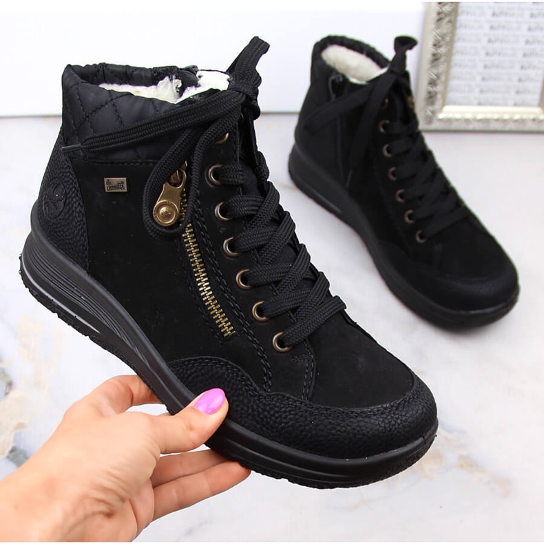 Stivali isolati da donna in pelle impermeabile nera Rieker L7701-00 nero