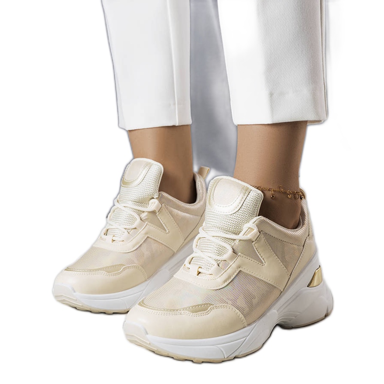 Sneakers beige con inserti metallici di Ruais