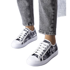 Sneaker in tessuto bianco e nero di Aucoin