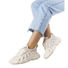 Sneakers beige su una suola Beth alla moda