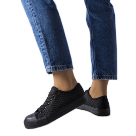Sneakers nere in tessuto intrecciato di Thibodeau nero