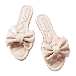 Eleganti sandali beige con fiocco di Garnier