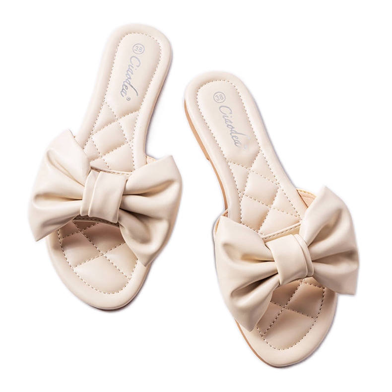Eleganti sandali beige con fiocco di Garnier