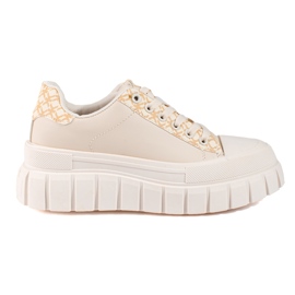 Sneakers crema da donna su una piattaforma alta Shelovet beige