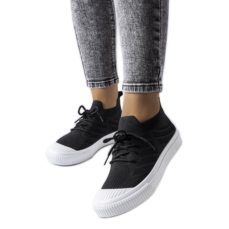Sneakers nere realizzate in tessuto elasticizzato di Polaire nero