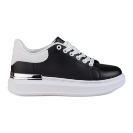 Scarpe sportive da donna su una piattaforma alta Shelovet in bianco e nero
