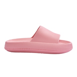 Infradito leggere alla moda su una massiccia suola rosa ribelle