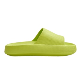 Pantofole leggere alla moda su una suola massiccia ribelle color lime verde