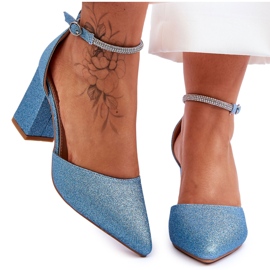 Eleganti pompe magiche blu lucide con strass