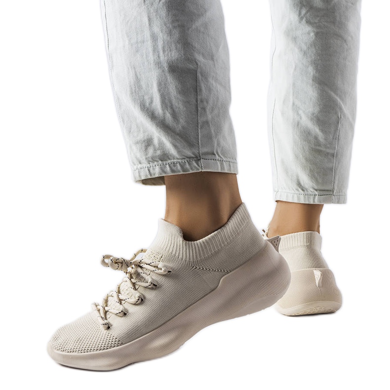 Sneaker in tela beige di Côté