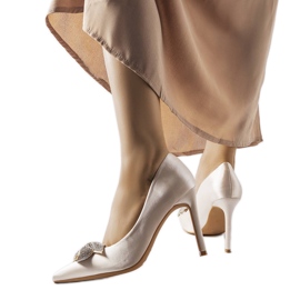 Spille beige con finitura satinata e fiocco Mia
