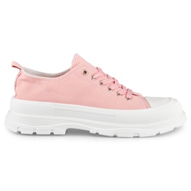 Sneakers rosa su una piattaforma bassa