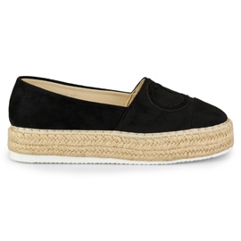 Espadrillas nere sulla piattaforma nero