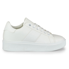Sneakers bianche da donna sulla piattaforma bianca