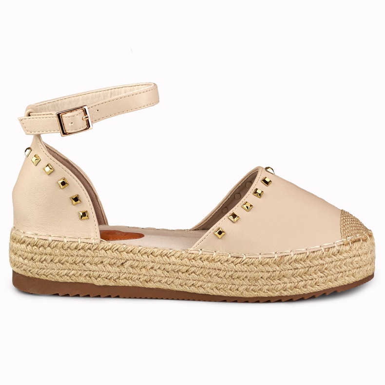 Espadrillas beige con borchie allacciate alla caviglia