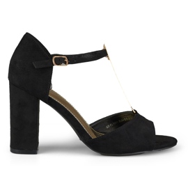 Eleganti sandali con tacco alto e decorazioni in oro nero