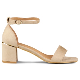 Sandali beige su tacco basso con dettaglio dorato